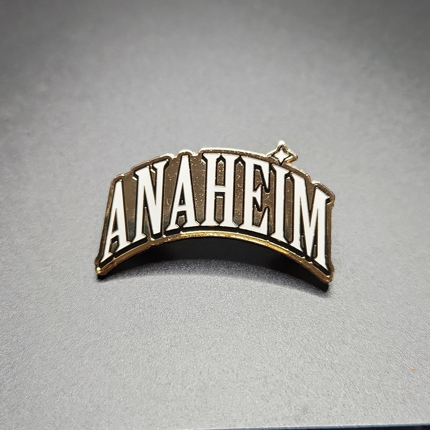 ANAHEIM - GOLD METAL + WHITE LETTERS